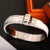 CHAINES HINGED BRACELET 12MM